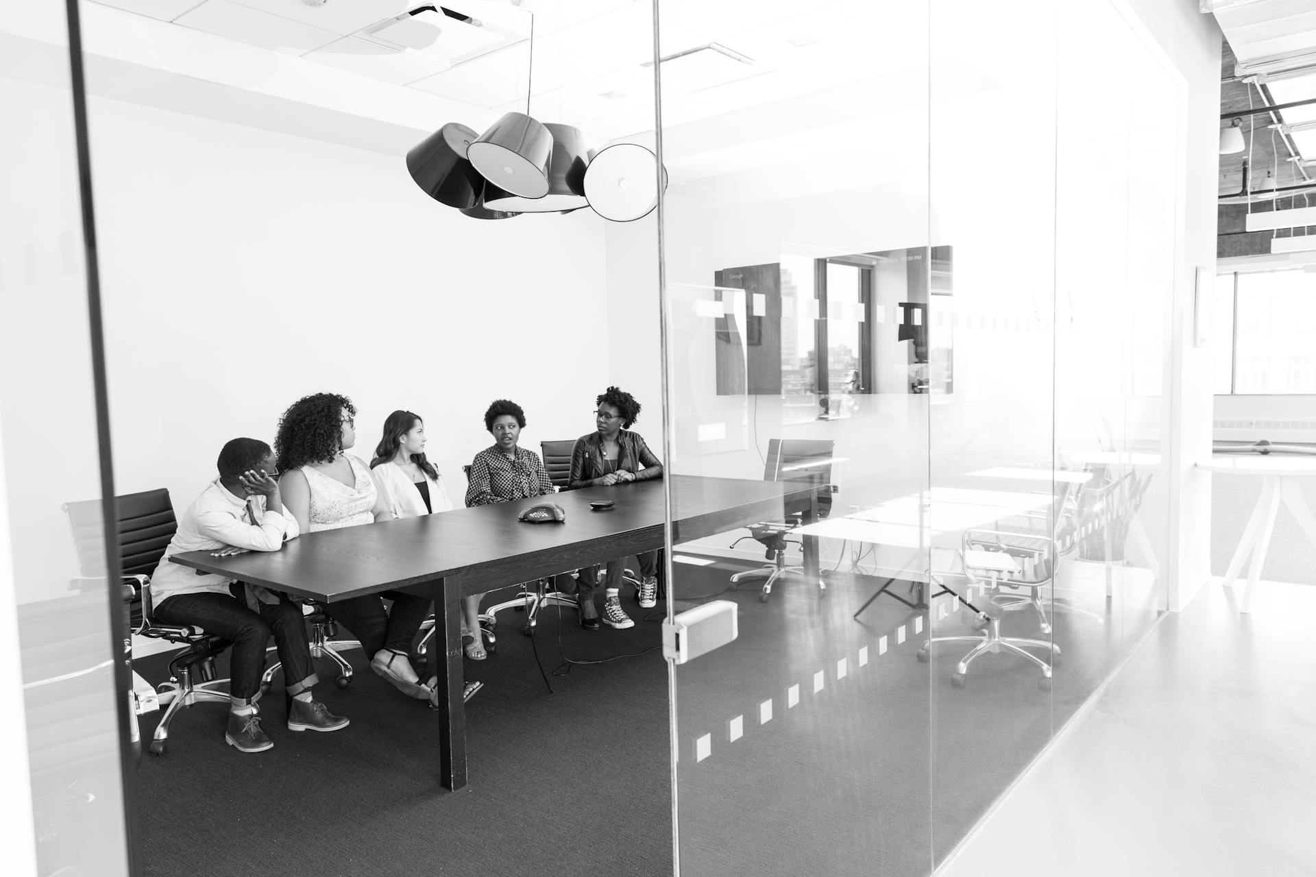People collaborating in a bright meeting room